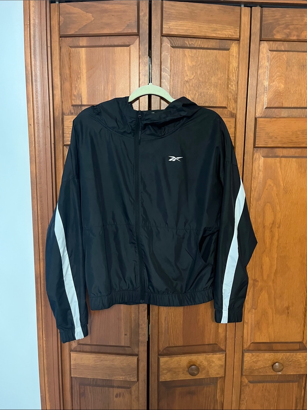 Reebok Black Hooded Windbreaker with White Sleeve Stripes Sz. M
